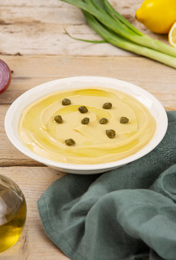 Spaltererbsepüree mit Zwiebeln und Zitronensaft