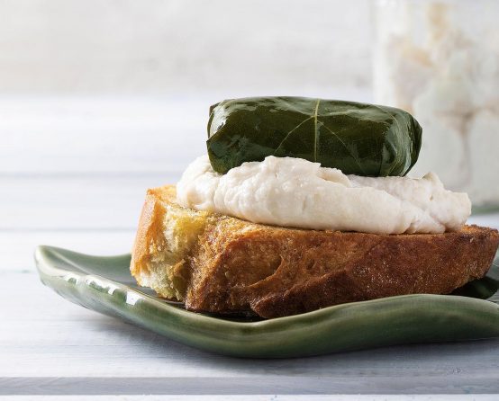 Paliria quinoa dolmas on grilled bread with fish roe cream