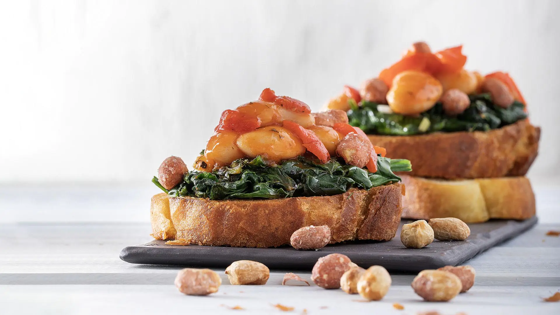 Bruschetta with Paliria Baked Giant Beans, Spinach & groundnuts