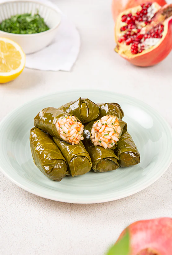 Stuffed vine leaves with rice, pomegranate syrup & spices